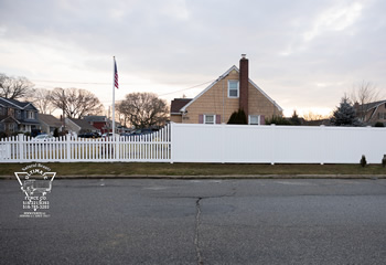 Back Fence Transitions into Front Fence with a Waterfall Picket Section