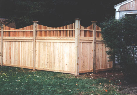 Wood Fence with Scallop Spindle Top