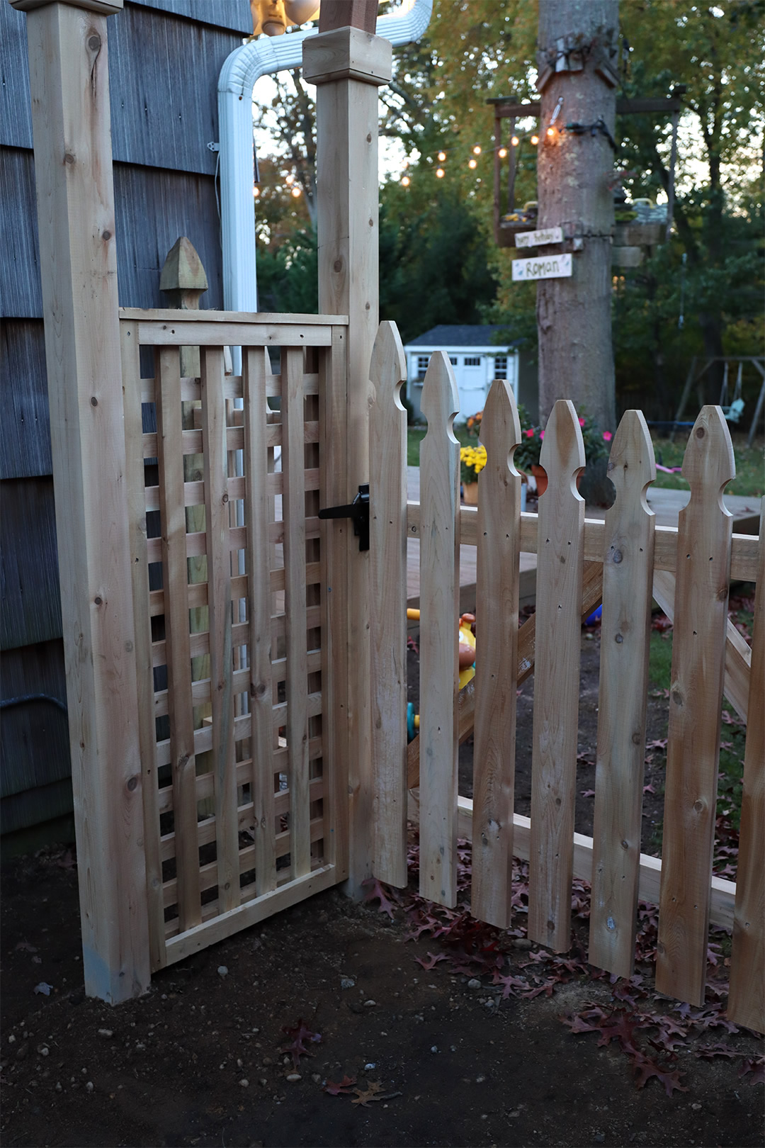 Cedar Arbor With Spaced Picket Fence