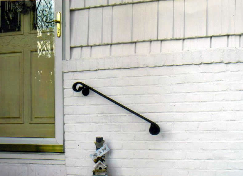 Basic Handrail Attached to Wall of House